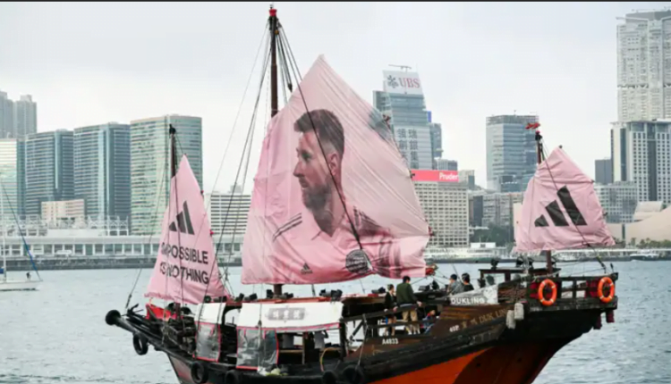 Lionel Messi takes over Hong Kong! Traditional sailing boat featuring legendary Argentine's face spotted in Victoria Harbour as adoring fans go wild for David Beckham and boy band Mirror at sold-out p
