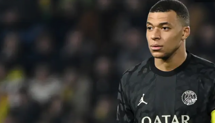 Kylian Mbappe is chilling! PSG forward changes out of kit to greet public and takes selfies after half-time substitution - rather than rejoin bench - in bizarre scenes during Monaco clash