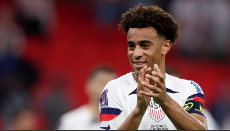 USMNT star Tyler Adams brings infant son Jax onto pitch to soak in CONCACAF Nations League victory celebrations - but he's not impressed by Christian Pulisic's winners medal!