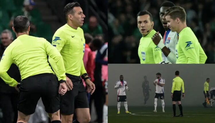 Fiery Lyon derby with Saint-Etienne suspended for 40 MINUTES as assistant referee is hit by missile thrown from stands